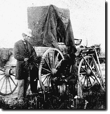 Gardner (seated w/lens) and Associate w/Photo Wagon, 1867